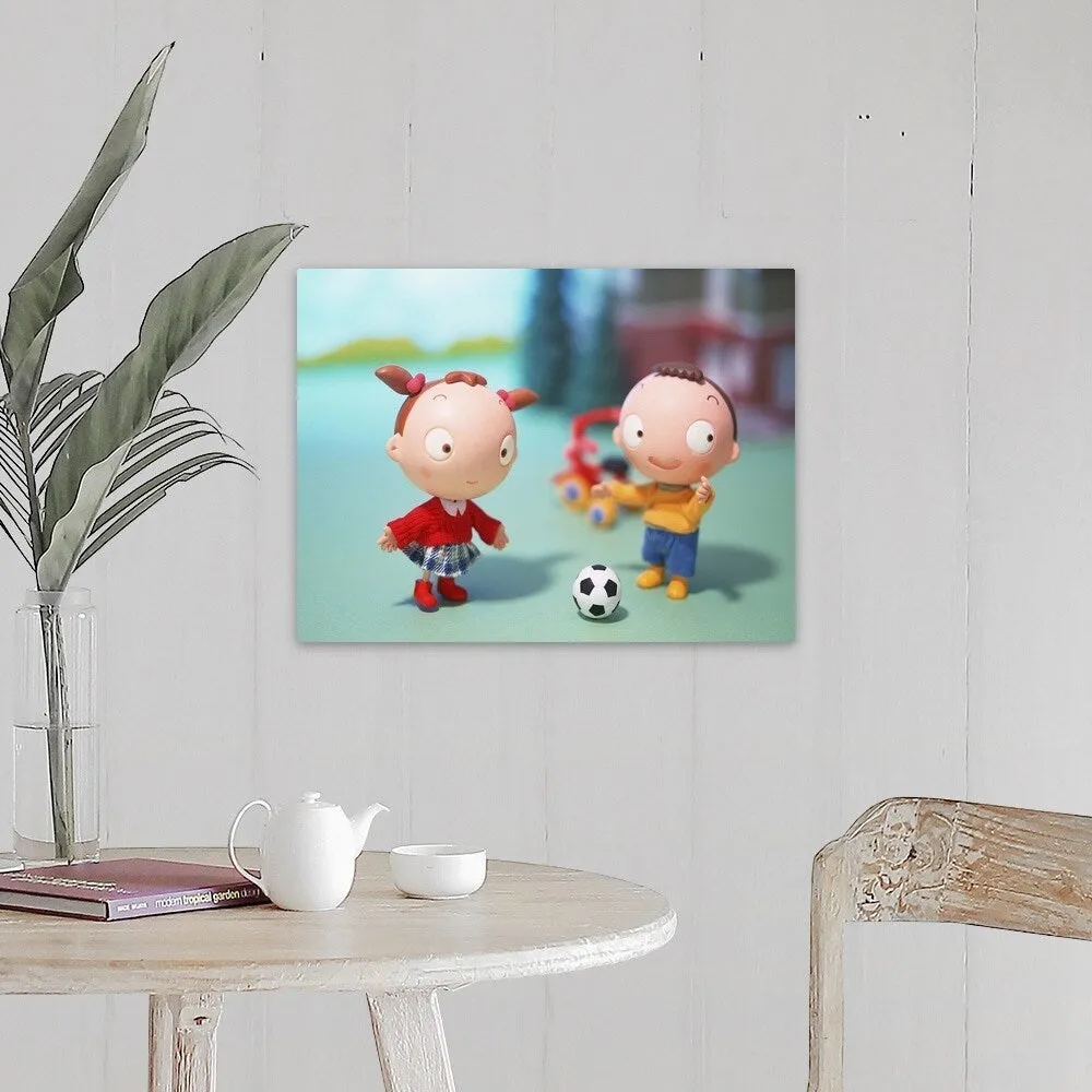 "Boy and Girl playing soccer" Canvas Wall Art