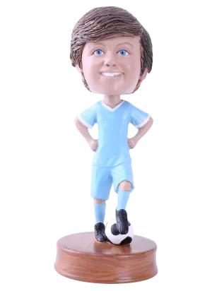Young Soccer Player Standing with Foot on Ball - Male or Female